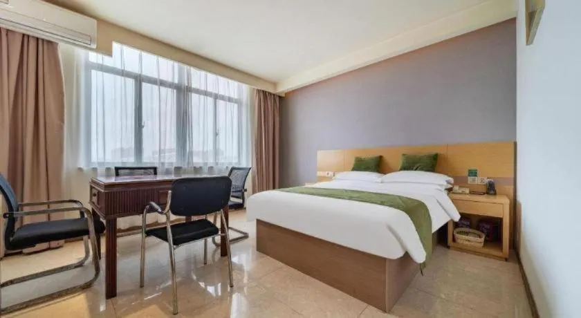 Bed in GreenTree Inn Nantong Zhangzhishan Town Deli Plaza Express Hotel