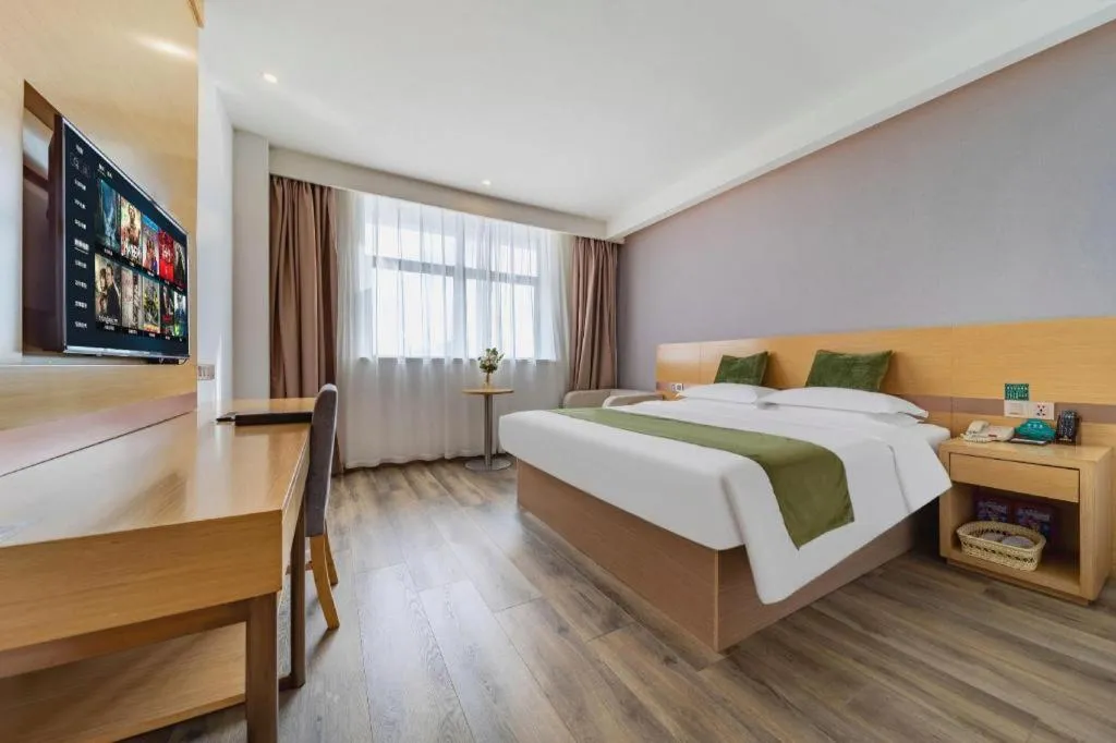 Bed in GreenTree Inn Nantong Zhangzhishan Town Deli Plaza Express Hotel