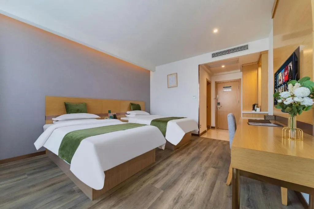 Bed in GreenTree Inn Nantong Zhangzhishan Town Deli Plaza Express Hotel