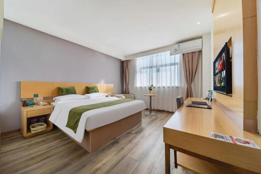 Bed in GreenTree Inn Nantong Zhangzhishan Town Deli Plaza Express Hotel