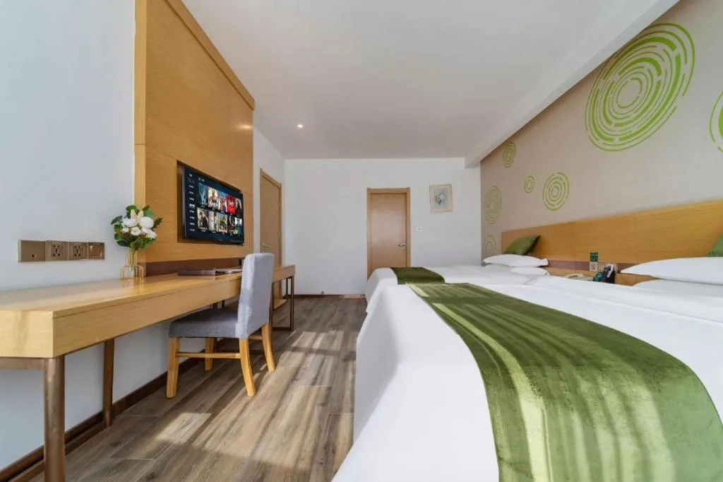 Bed in GreenTree Inn Nantong Zhangzhishan Town Deli Plaza Express Hotel