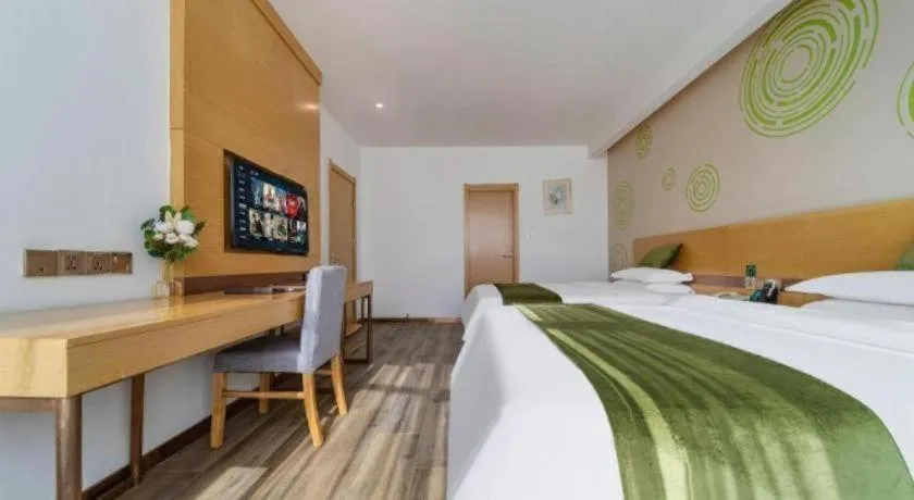 Bed in GreenTree Inn Nantong Zhangzhishan Town Deli Plaza Express Hotel