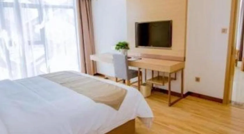 Bed in GreenTree Inn Nantong Zhangzhishan Town Deli Plaza Express Hotel