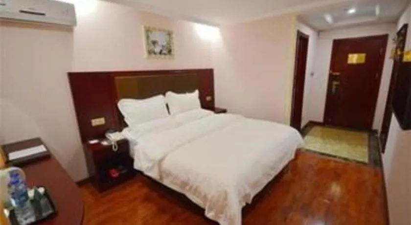 Bed in GreenTree Inn Nantong Zhangzhishan Town Deli Plaza Express Hotel