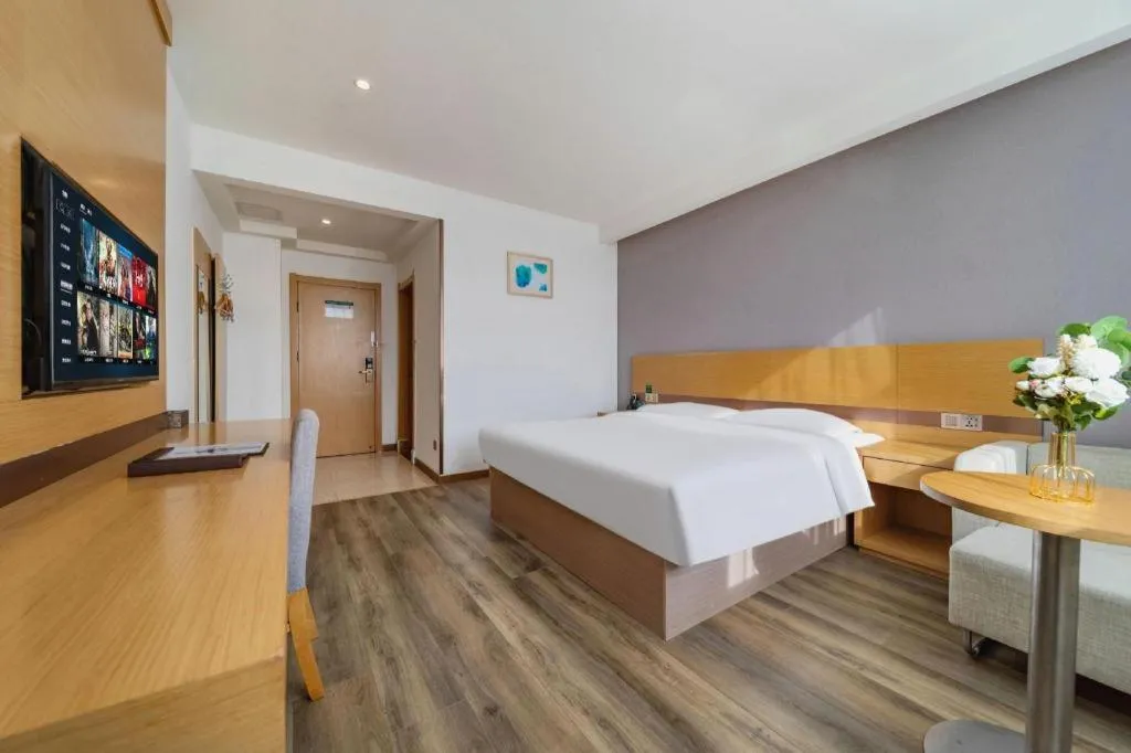 Bed in GreenTree Inn Nantong Zhangzhishan Town Deli Plaza Express Hotel