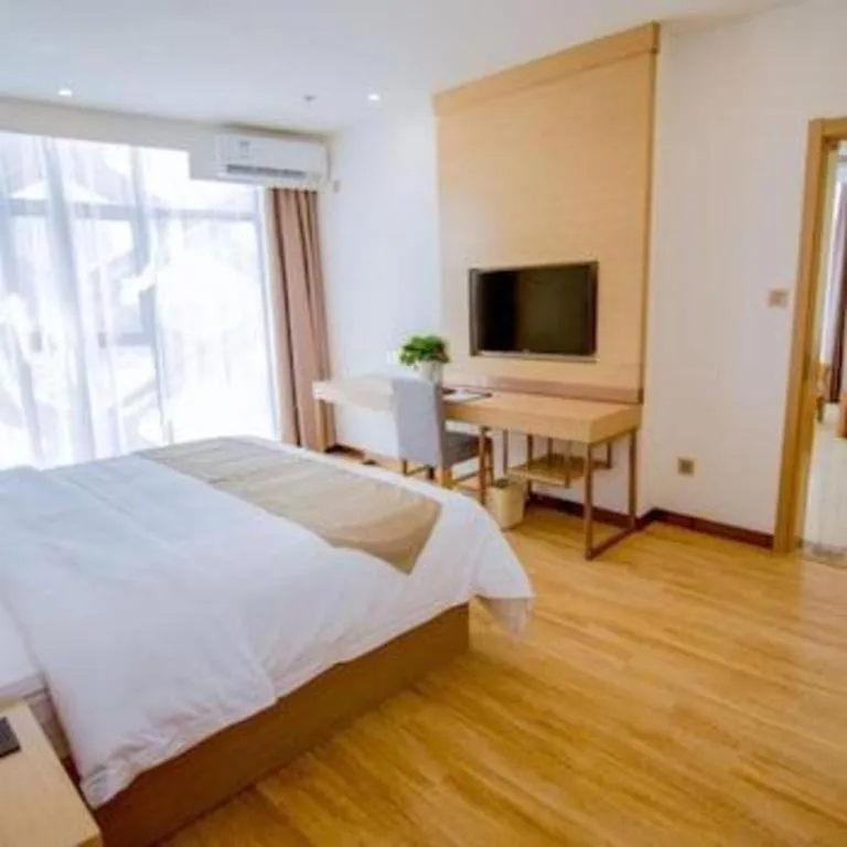 Bed in GreenTree Inn Nantong Zhangzhishan Town Deli Plaza Express Hotel