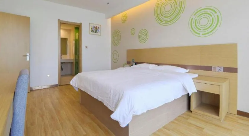 Bed in GreenTree Inn Nantong Zhangzhishan Town Deli Plaza Express Hotel