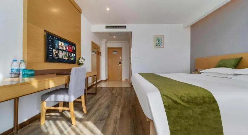 Bed in GreenTree Inn Nantong Zhangzhishan Town Deli Plaza Express Hotel