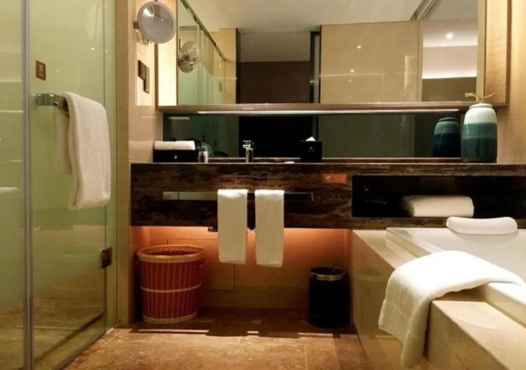 Bed in LONGYAN JINGHUA FLIPORT HOTEL