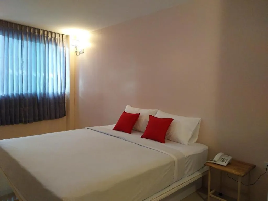 Bed in BIRD ROOM HOTEL - PRATUNAM