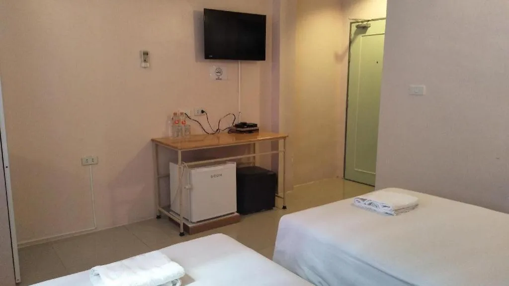 Bed in BIRD ROOM HOTEL - PRATUNAM