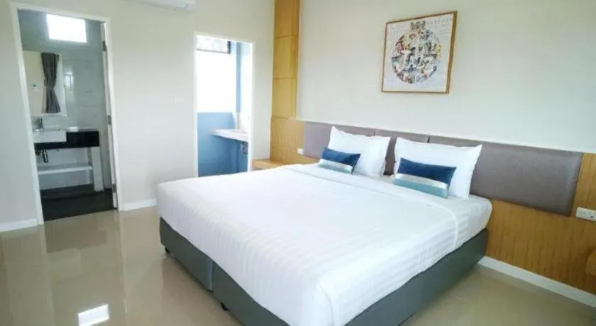 Bed in APA-TREE Boutique Hotel