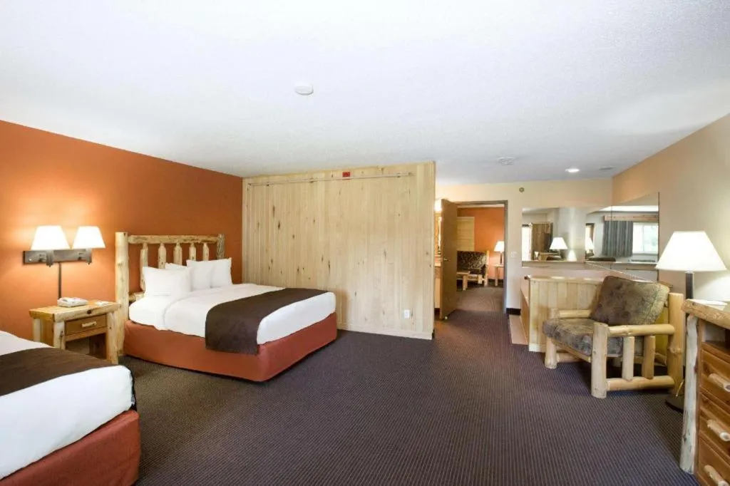 Bed in AmericInn by Wyndham Pequot Lakes