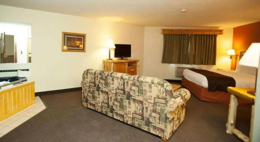 Bed in AmericInn by Wyndham Pequot Lakes