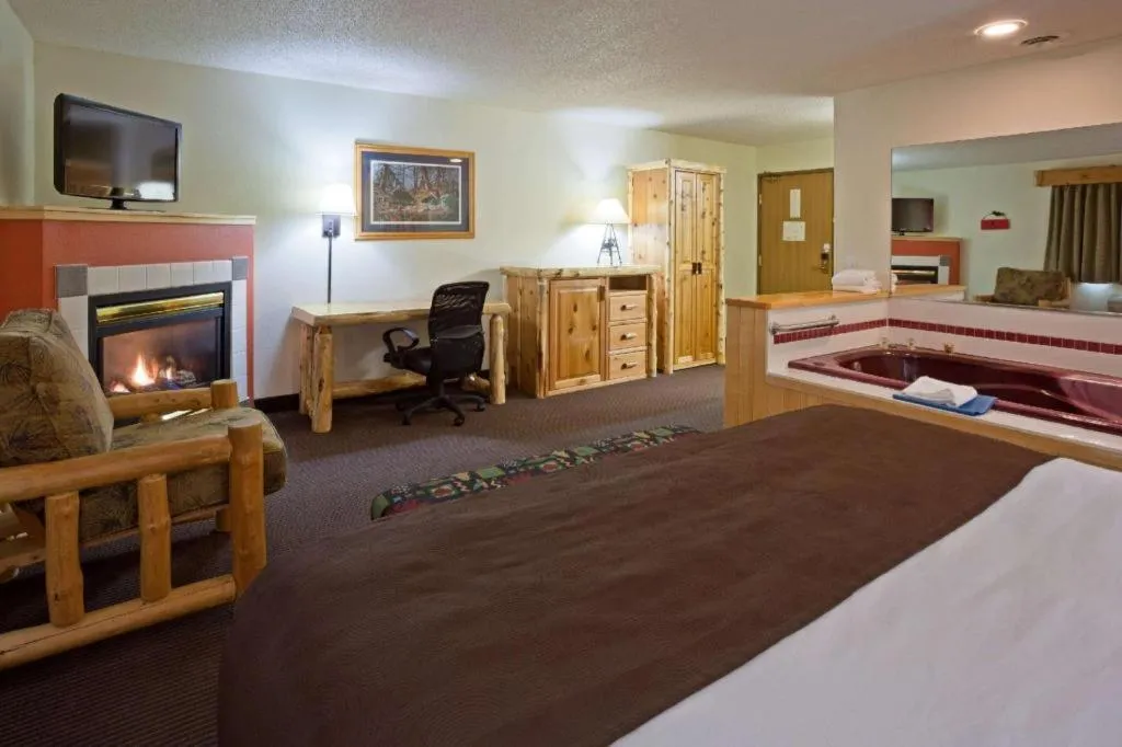 Bed in AmericInn by Wyndham Pequot Lakes
