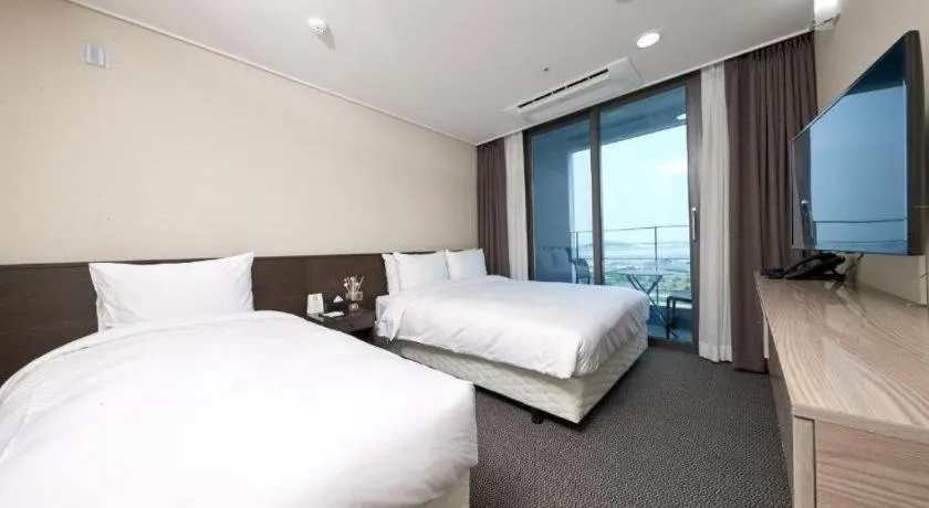 Bed in Riviera Incheon Airport Hotel