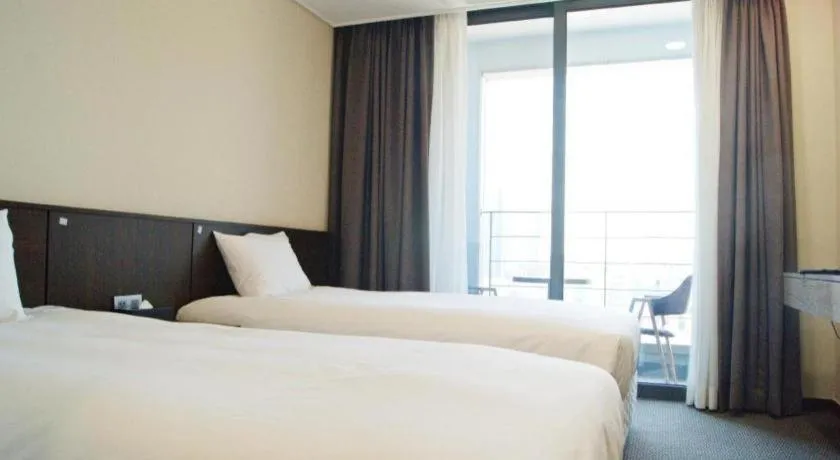 Bed in Riviera Incheon Airport Hotel