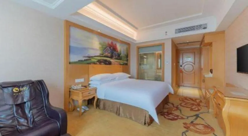 Bed in Vienna Hotel Guangdong Qingyuan Wanda Plaza Xincheng Beijiang