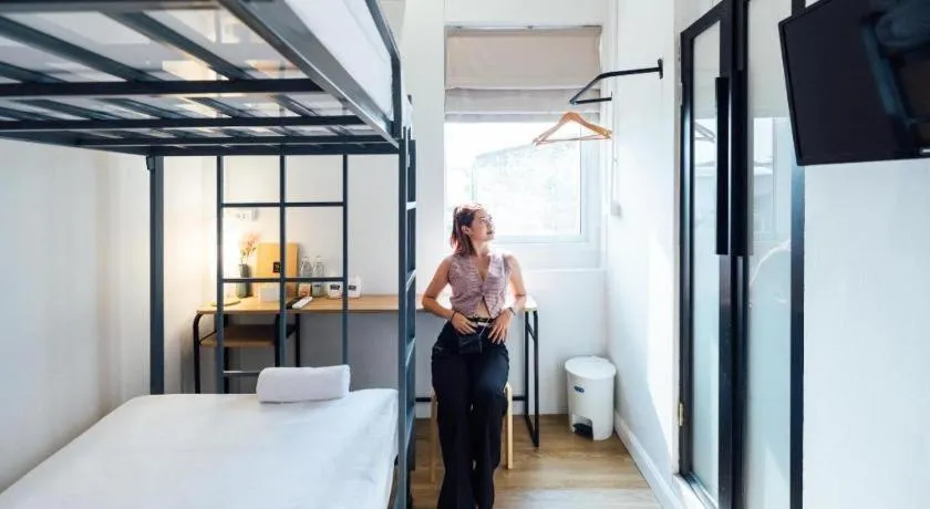 Bed in Sirichai Design Hotel