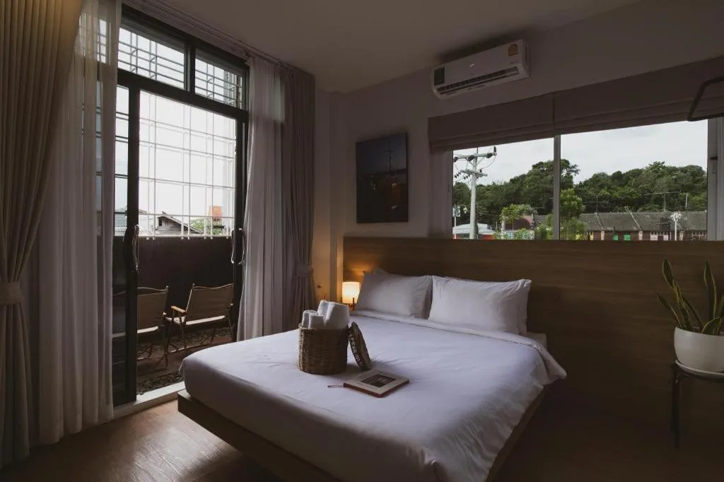 Bed in Sirichai Design Hotel