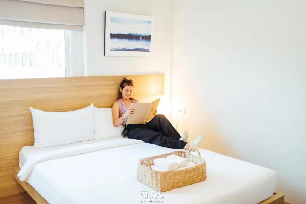 Bed in Sirichai Design Hotel