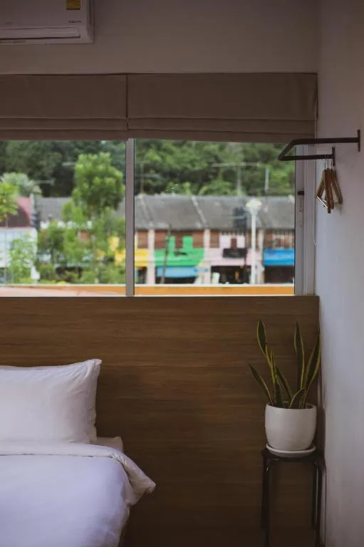 Bed in Sirichai Design Hotel