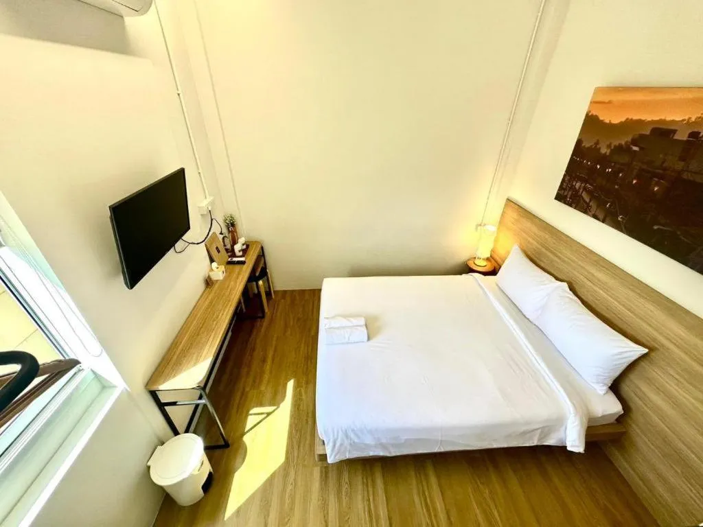 Bed in Sirichai Design Hotel