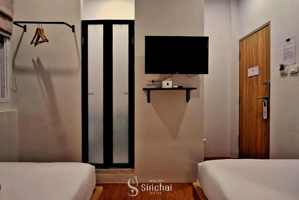 Bed in Sirichai Design Hotel