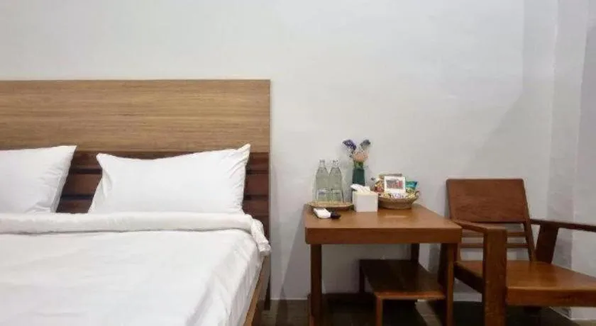 Bed in Sirichai Design Hotel