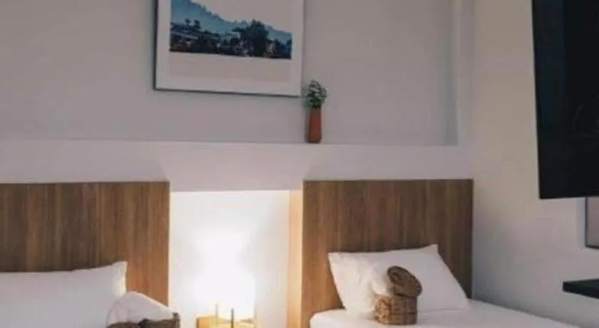 Bed in Sirichai Design Hotel