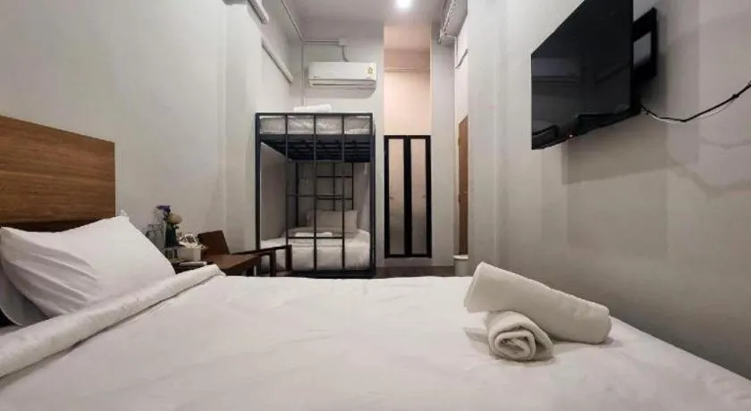 Bed in Sirichai Design Hotel