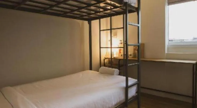 Bed in Sirichai Design Hotel