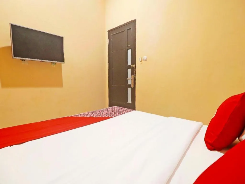 Bed in Hotel O Papi Inn Guesthouse