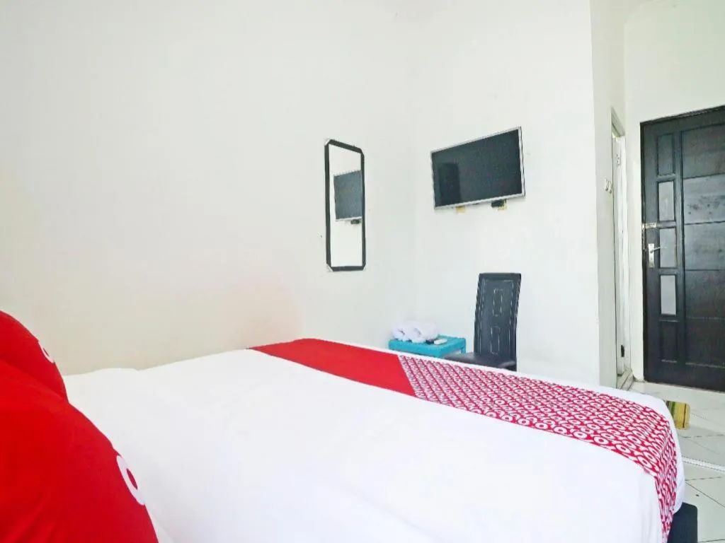 Bed in Hotel O Papi Inn Guesthouse