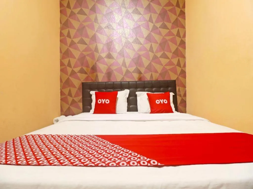 Bed in Hotel O Papi Inn Guesthouse