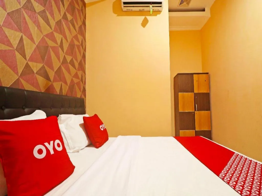 Bed in Hotel O Papi Inn Guesthouse