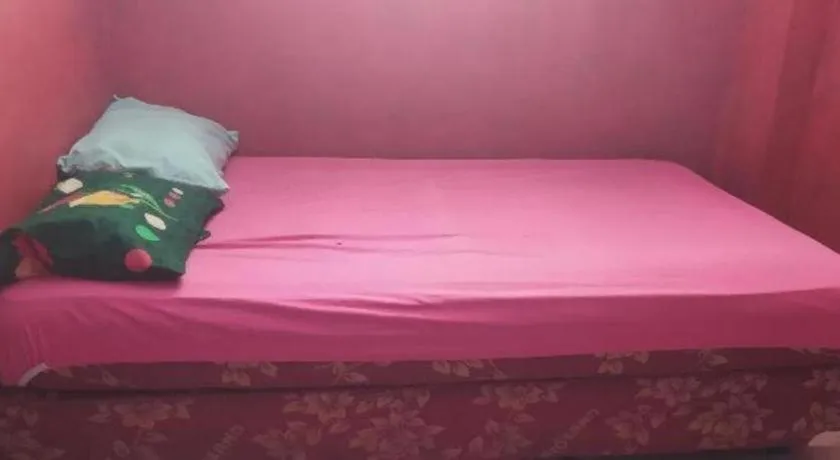 Bed in Hotel O Papi Inn Guesthouse