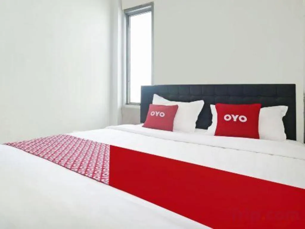 Bed in Hotel O Papi Inn Guesthouse