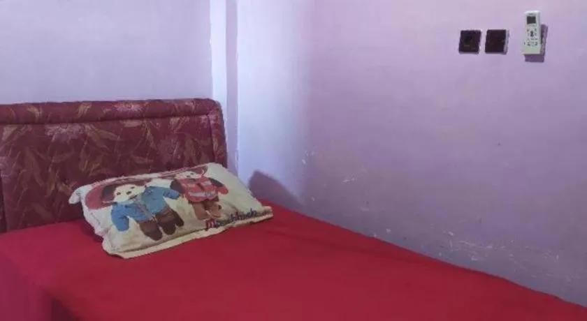 Bed in Hotel O Papi Inn Guesthouse