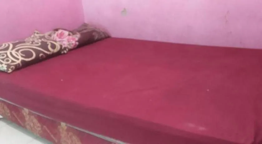 Bed in Hotel O Papi Inn Guesthouse