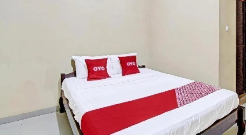 Bed in OYO 91353 Hotel Surya Andesa