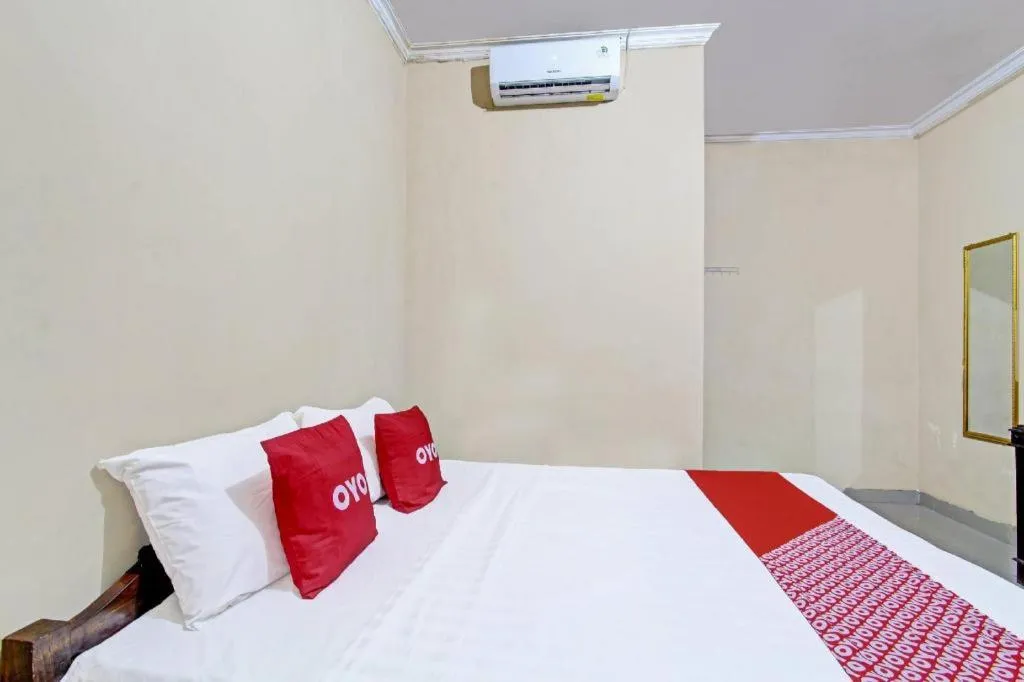 Bed in OYO 91353 Hotel Surya Andesa