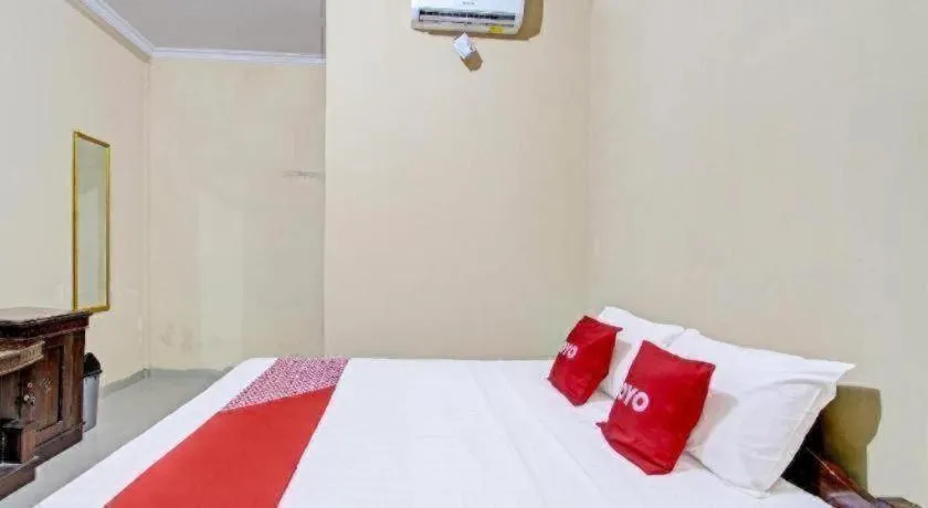 Bed in OYO 91353 Hotel Surya Andesa