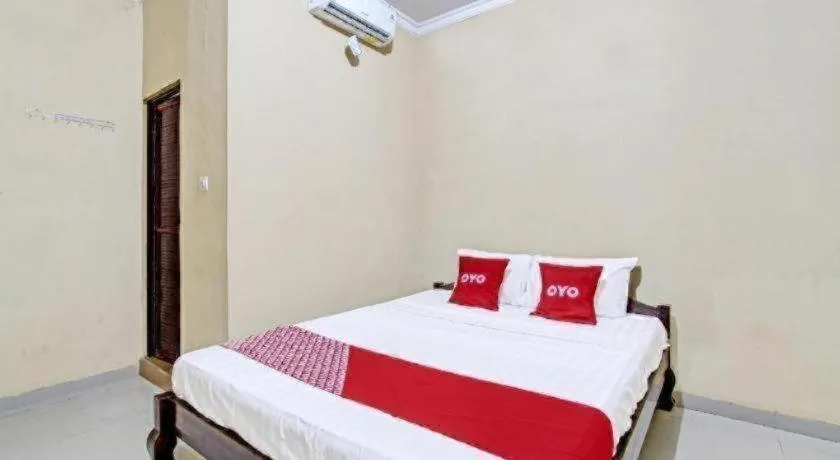 Bed in OYO 91353 Hotel Surya Andesa