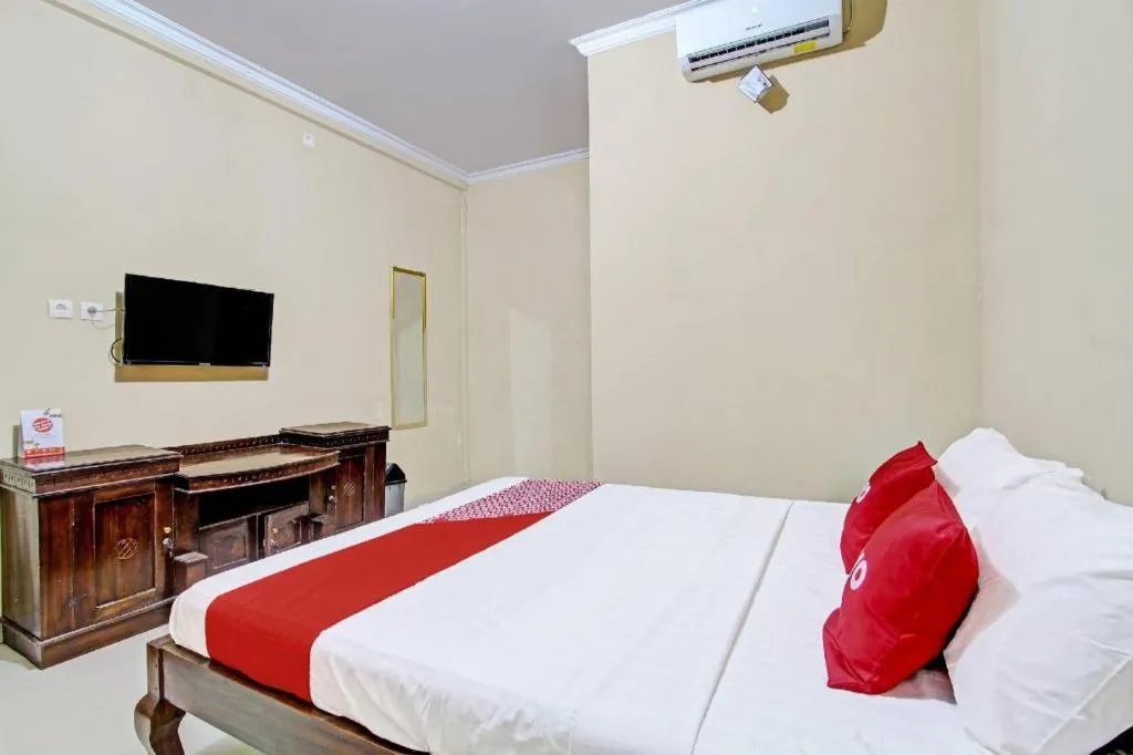 Bed in OYO 91353 Hotel Surya Andesa