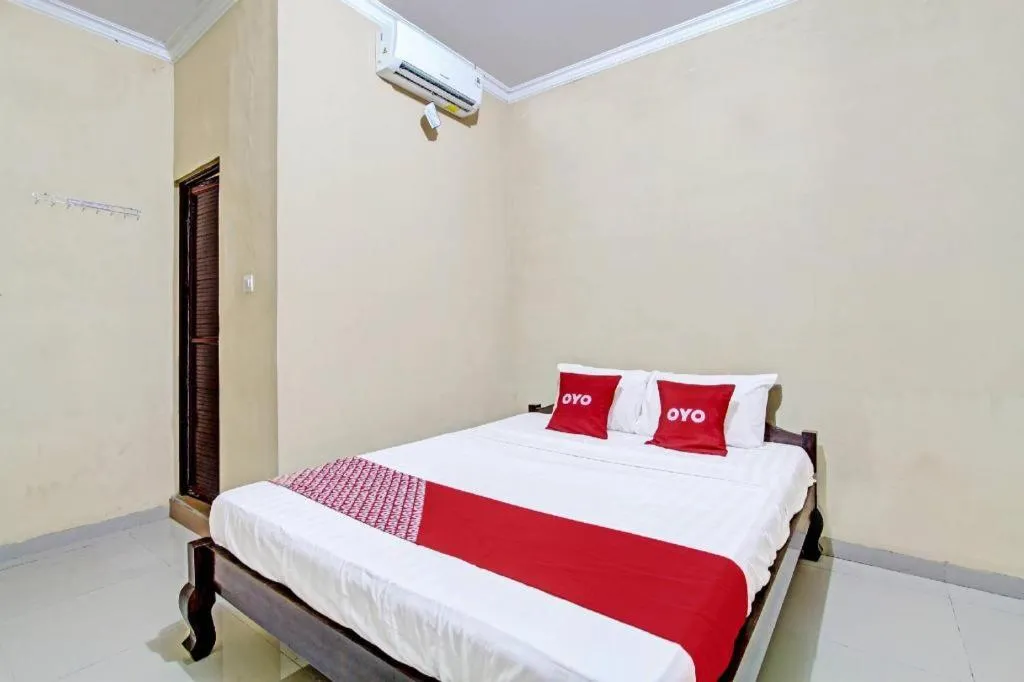 Bed in OYO 91353 Hotel Surya Andesa