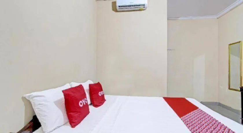 Bed in OYO 91353 Hotel Surya Andesa