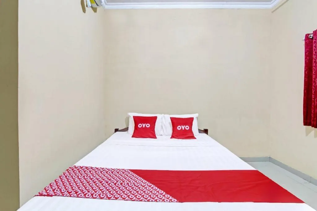 Bed in OYO 91353 Hotel Surya Andesa