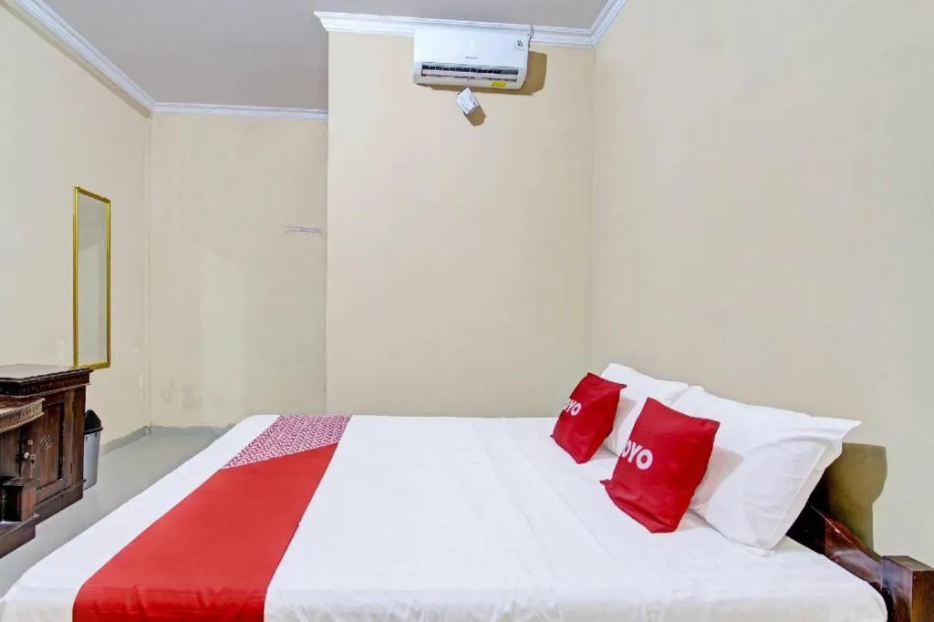 Bed in OYO 91353 Hotel Surya Andesa