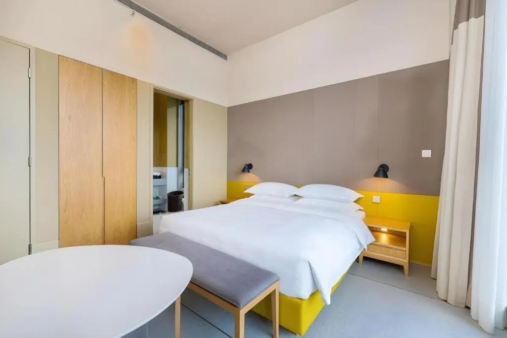 Bed in SongShan Lake PingShang Serviced Hotel